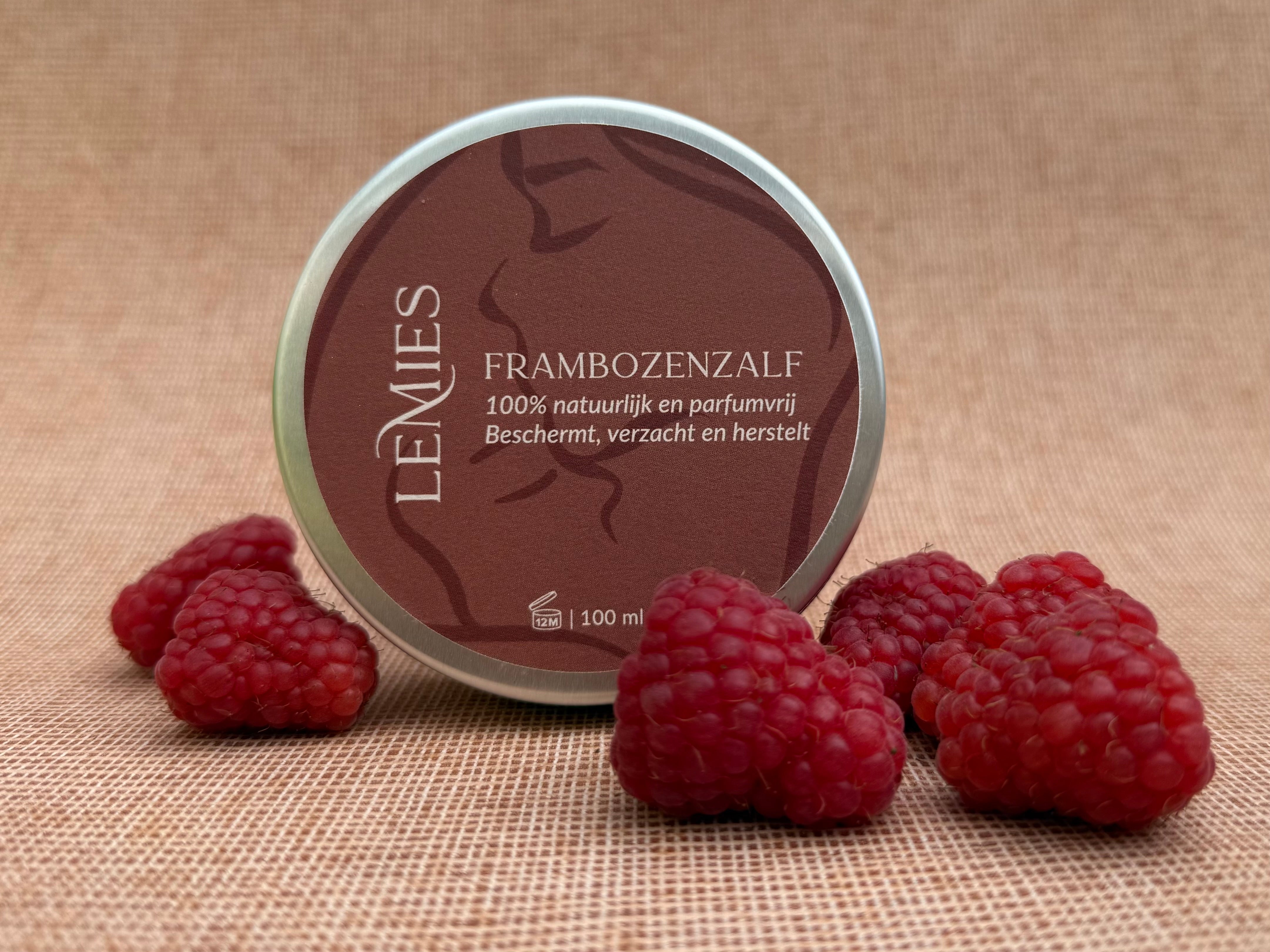 Foto van gesloten blik Frambozenzalf van merk LeMies met verse Frambozen eromheen
