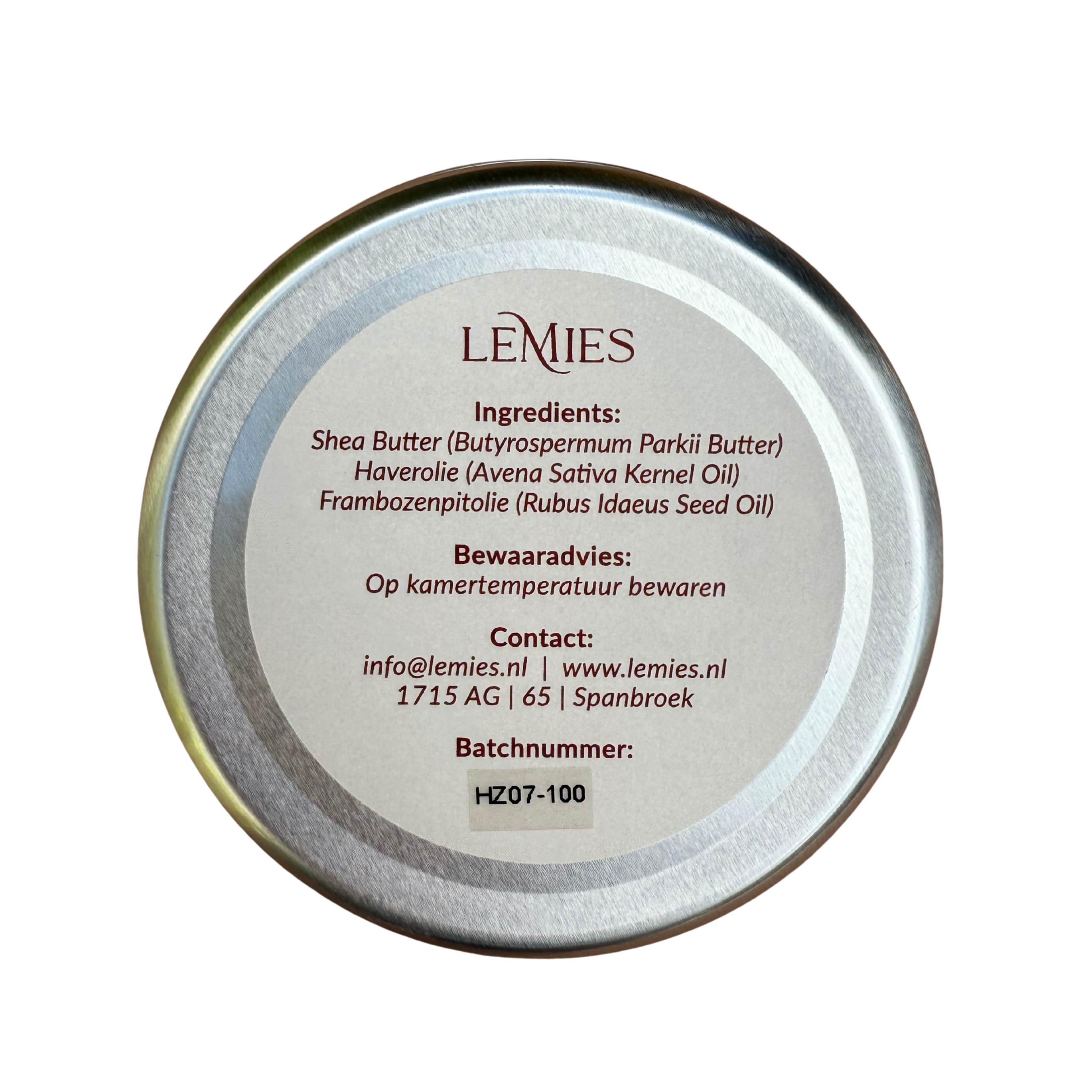 Achterkant Lemies natuurlijke zalf met ingrediëntenlijst – shea butter, haverolie en frambozenpitolie, bewaarinstructies en batchnummer.
